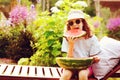 Summer happy child girl eating watermelon outdoor on vacation Royalty Free Stock Photo