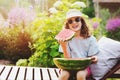 Summer happy child girl eating watermelon outdoor on vacation Royalty Free Stock Photo