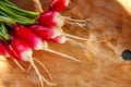 Large bunch of raw fresh juicy garden radish on wooden board Royalty Free Stock Photo