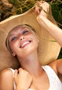 Summer, hat and portrait with woman in field for travel, vacation and holiday. Smile, peace and nature with female