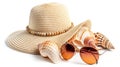 Summer hat, sunglasses, and seashells isolated on a white background, beach holiday concept Royalty Free Stock Photo