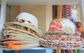 Summer hats for sale in a market stall outdoor. Royalty Free Stock Photo