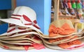 Summer hats for sale in a market stall outdoor. Royalty Free Stock Photo