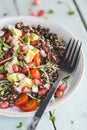 Summer Healthy Salad with Quinoa, Avocado, Pomegranate, Tomatoes and Tahini Sauce