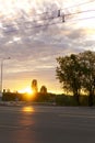 summer, heat, travel, weather, cityscape - background wide paved roadway road with city cars in spring hot evening at Royalty Free Stock Photo