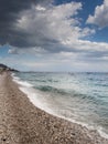 Summer holiday background, Sicily coast, Clear blue wave of the Mediterranean sea, Selective focus. Vertical image Royalty Free Stock Photo