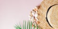 Summer holiday background. Tropical summer concept with woman fashion accessories, leaves and seashells on yellow background. Flat Royalty Free Stock Photo