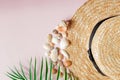 Summer holiday background. Tropical summer concept with woman fashion accessories, leaves and seashells on yellow background. Flat Royalty Free Stock Photo