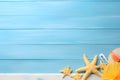 Summer Holiday Banner beach theme with beach accessories on a blue wood background Royalty Free Stock Photo