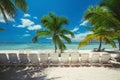 Summer holiday and exotic vacation on Saona island. Sea chairs on tropical beach, palm trees and white sand. Travel landscape Royalty Free Stock Photo