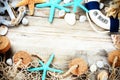 Summer holiday frame with seashells and beach accessories Royalty Free Stock Photo