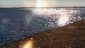 Summer Holiday Seascape Sunset  exotic  sea beach in Harbor water wave reflection skyscape Tallinn  panorama horizon stone   l Royalty Free Stock Photo