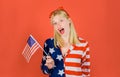 Summer holiday. 4th July. Independence day celebration. Fashion girl with american flag in hand. National colors USA. Patriotic