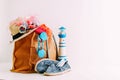 Summer holiday travel concept.Hipster Beach bag with items for a Royalty Free Stock Photo