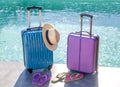 Suitcases, sandals and panama hat at the pool Royalty Free Stock Photo