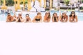 Summer holiday vacation for caucasian women friends - group of young females lay down at the pool enjoying the hot season together Royalty Free Stock Photo