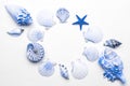 Summer holidays background. Frame of trendy aquamarine light blue pastel color seashells, starfish isolated on white Royalty Free Stock Photo