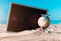 Summer holidays background. Starfish, seashells, toy plane and globe near blackboard on ocean nature beach. Design of Royalty Free Stock Photo