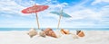 Summer holidays beach banner - Umbrellas seashells on sand