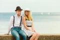 Loving couple retro style dating on sea coast Royalty Free Stock Photo