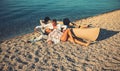 Summer holidays and marine trip. Love relations of couple enjoying summer day together. woman and man at sea water Royalty Free Stock Photo