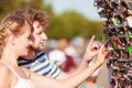 Young couple buying new sunglasses outdoor Royalty Free Stock Photo