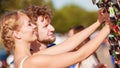 Young couple buying new sunglasses outdoor Royalty Free Stock Photo