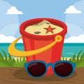 Summer holidays - sunglasses, bucket, shovel sand on a sunny day Royalty Free Stock Photo