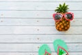 summer holidays vacation concept,pineapple watermelon o wooden background with copy space