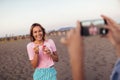 Girl Eating Ice Cream On The Beach