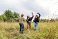 Summer holidays vacation happy people concept. Group of three friends boy and two girls dancing and having fun together Royalty Free Stock Photo