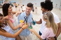 Group of friends having fun on the beach. Summer holidays, vacation and people concept. Royalty Free Stock Photo