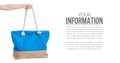 Summer holidays, vacation and travel concept. Beach handbag travel in hand