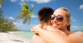 Happy couple hugging on summer beach Royalty Free Stock Photo