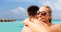 Happy couple hugging on summer beach Royalty Free Stock Photo