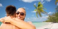 Happy couple hugging on summer beach Royalty Free Stock Photo