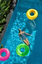 Summer Holidays. Woman Enjoying Vacation, Floating In Swimming Pool Royalty Free Stock Photo