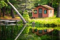 Summer home cabin in the woods at the lake Royalty Free Stock Photo
