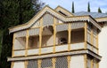 Summer house among cypresses