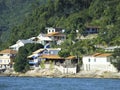 Summer houses in praia da lagoinha next to Bonbinhas hill, Brazil Royalty Free Stock Photo