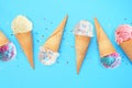 Summer ice cream cone flat lay over a blue background Royalty Free Stock Photo