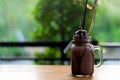 Summer ice fresh drink. Chocolate milkshake with ice cream and whipped cream, marshmallow served in glass mason jar,