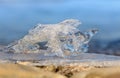 Summer ice on the lake Baikal at sunrise