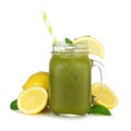 Summer iced matcha lemonade in a mason jar glass with lemons isolated on white Royalty Free Stock Photo