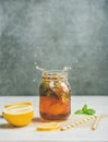 Summer Iced tea with lemon and herbs, copy space Royalty Free Stock Photo