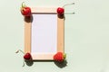 Summer information board,wooden frame on green background with red cherries berries fruits in corner, fresh berry Royalty Free Stock Photo