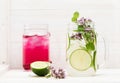 Summer infused detox cold waters with limes, cherries and berries in glass jars freemason Royalty Free Stock Photo