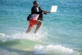 summer inspiration for business man. Beach productivity for director businessman. Businessman director running at the Royalty Free Stock Photo