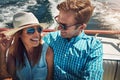 Summer isnt complete without a relaxing cruise. a young couple spending time together on a yacht. Royalty Free Stock Photo