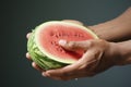 Summer joy mens hands embrace a watermelon on white canvas